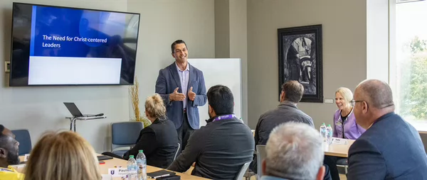 professor teaching graduate class