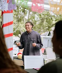 Male student in outdoor market