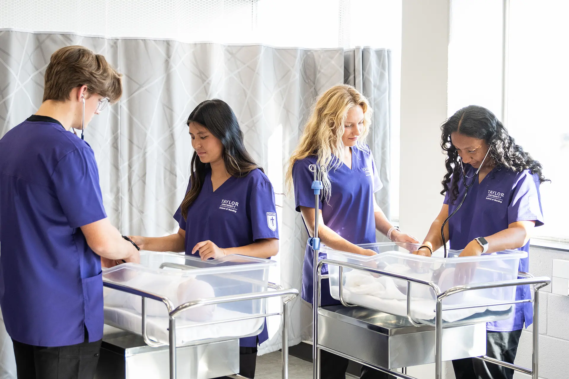 Nursing students with baby manikins
