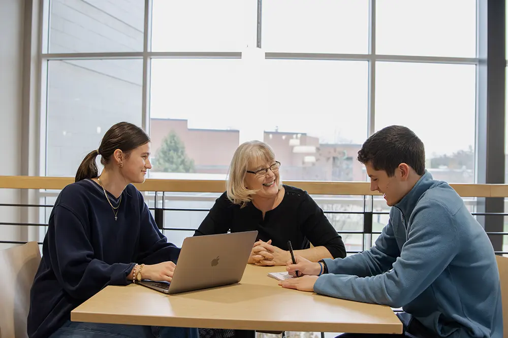 Professor talking to students