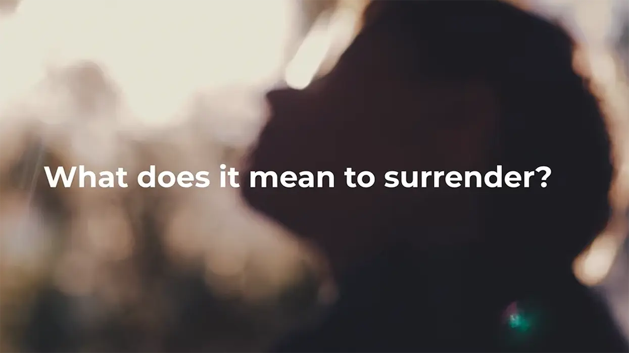 Person in silhouette looking upward