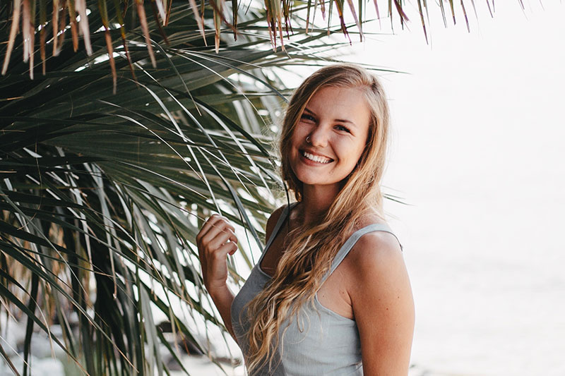 BreAnna Bailey in front of a palm tree