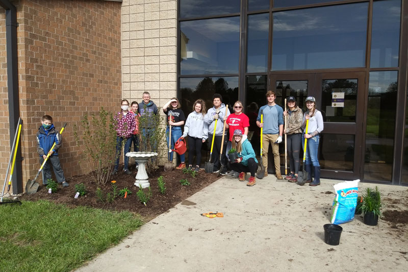 Students doing landscaping outside Randall Environmental Center