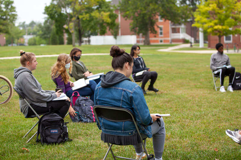 Bible students having class outside