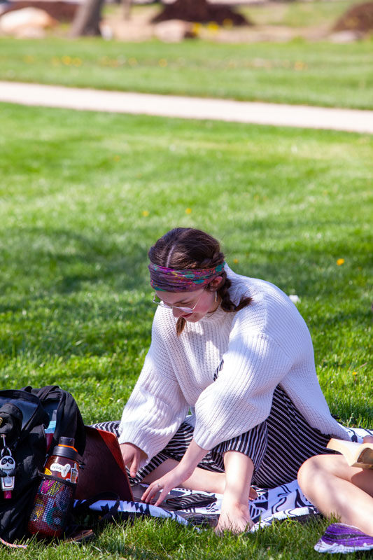 A student working during an outside class