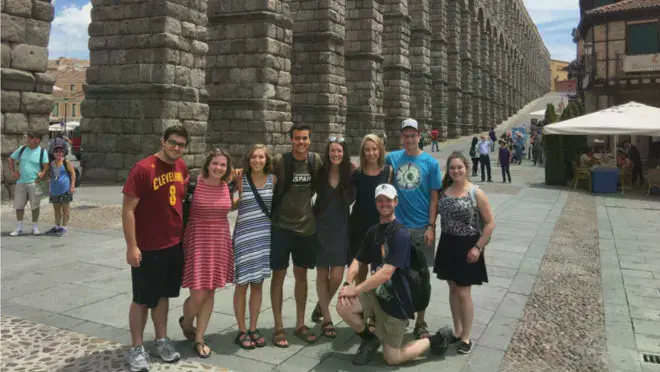 Taylor students gathered in front of the Aqueduct of Segovia