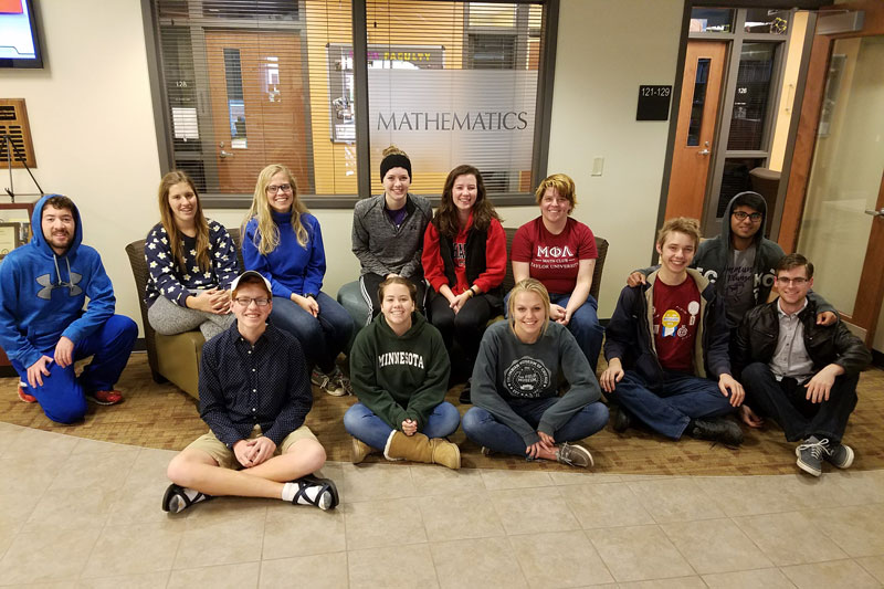 Math Club Members sitting outside the Math Office