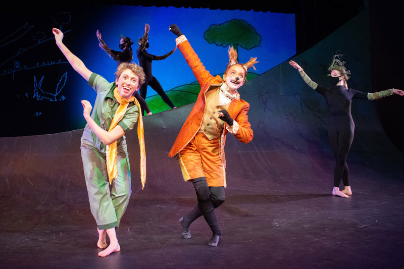 A boy dancing with a fox in The Little Prince