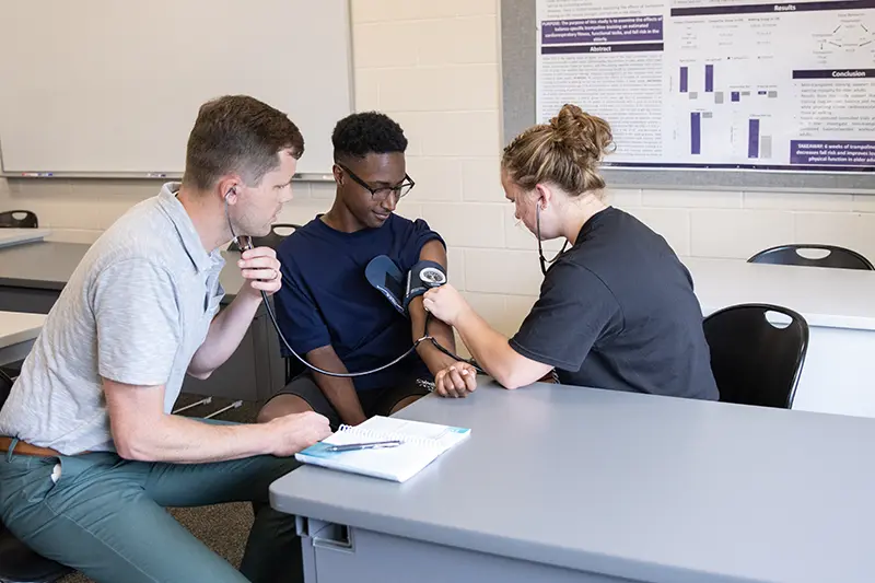students taking blood pressure