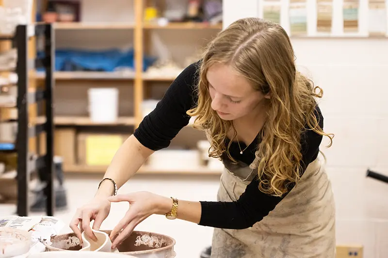 Samuel Morris statue and Metcalf visual arts building