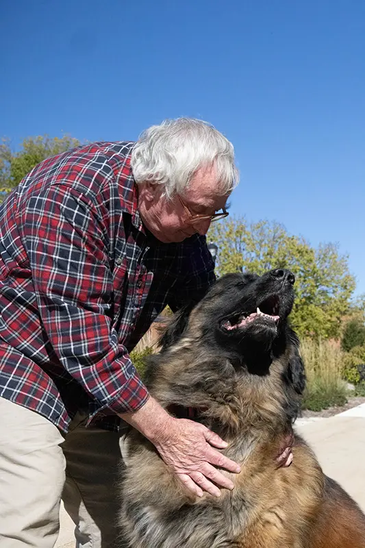 Dan Boyd petting Bayley