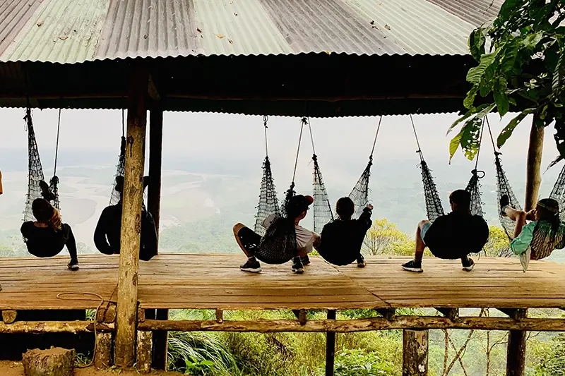 students in hammocks on the galapagos islands