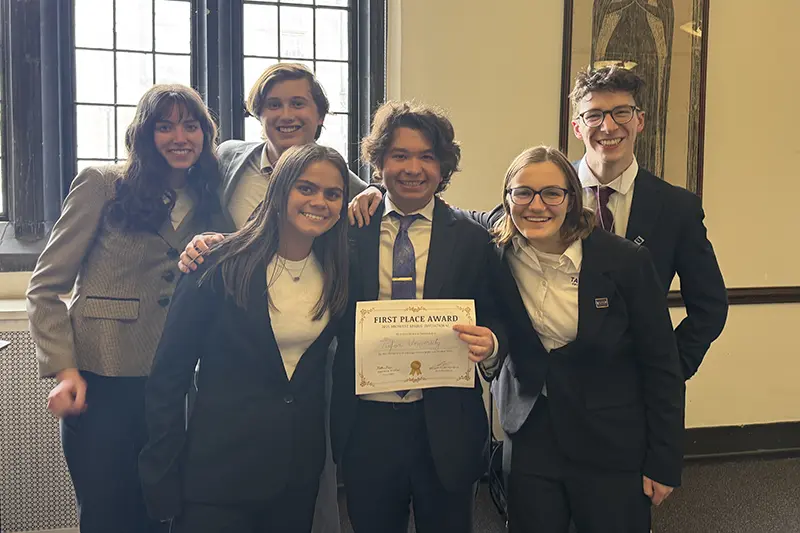 Ethics Bowl Team with award