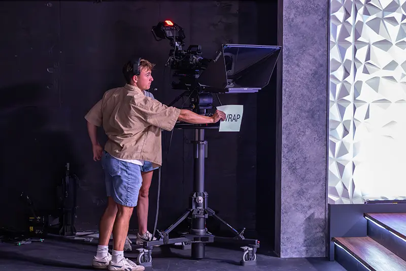 student working on film set