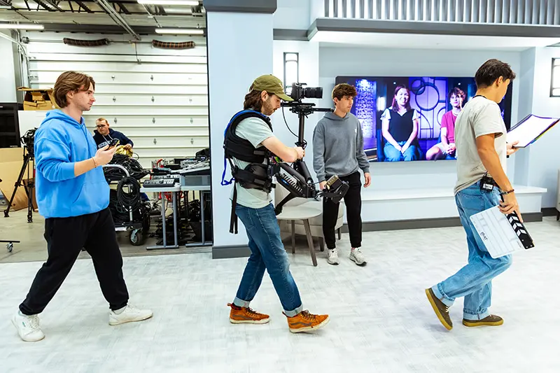 students working on set