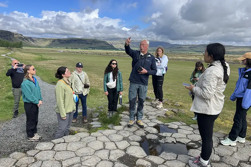 group listens to field lecture