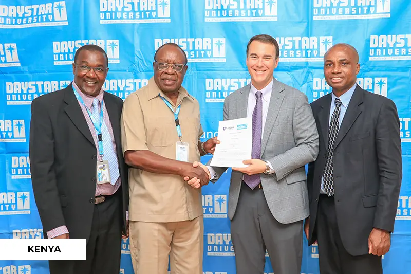 Michael Lindsay and Dan Darko with Daystar leaders