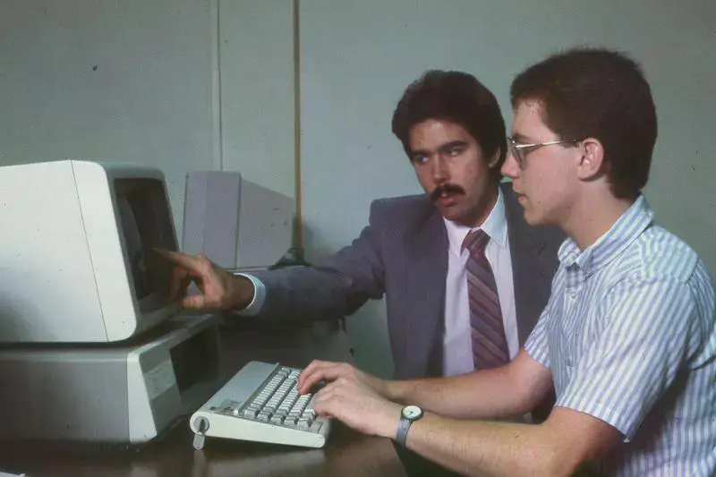 professor points to a computer