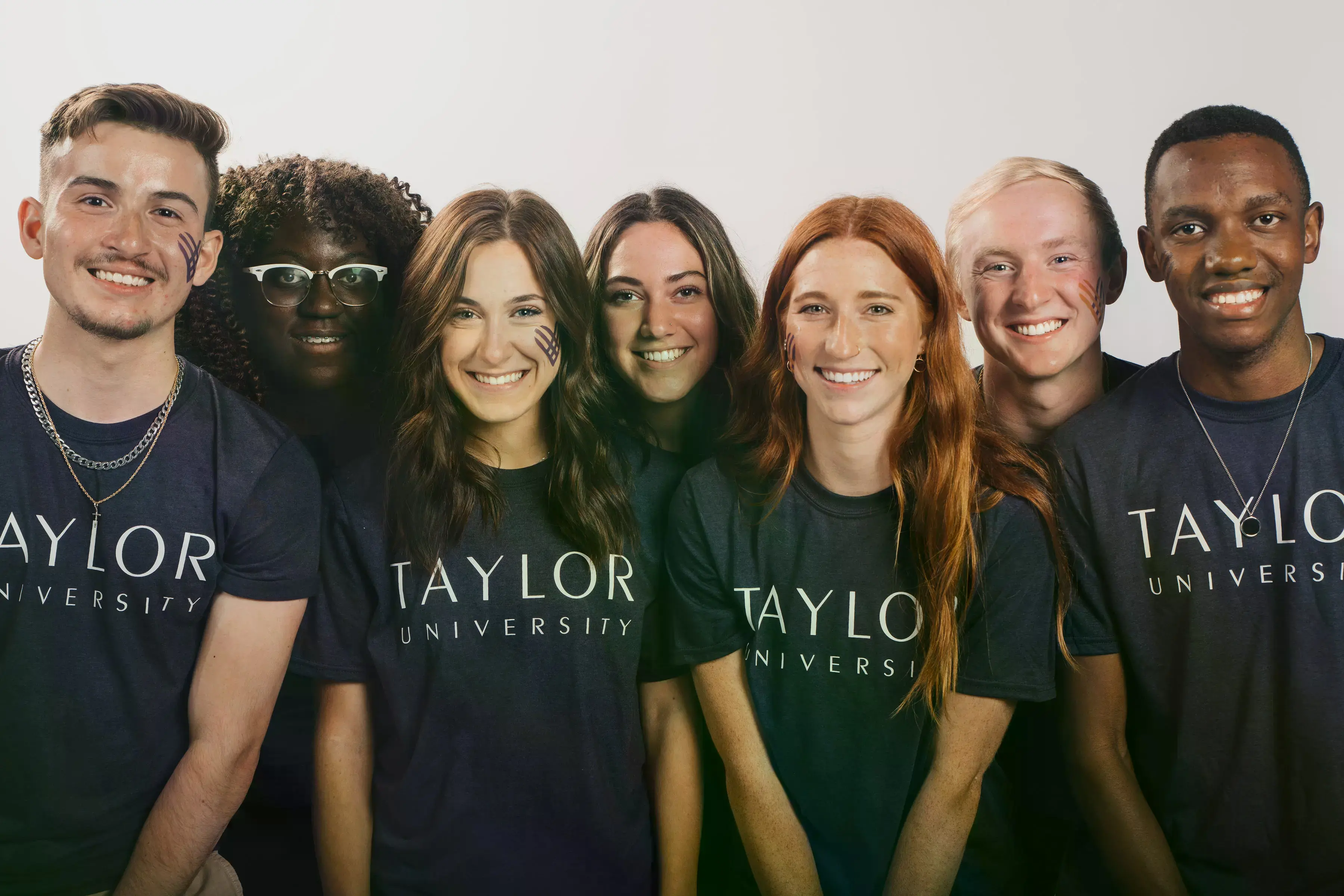 group of students in front of white background
